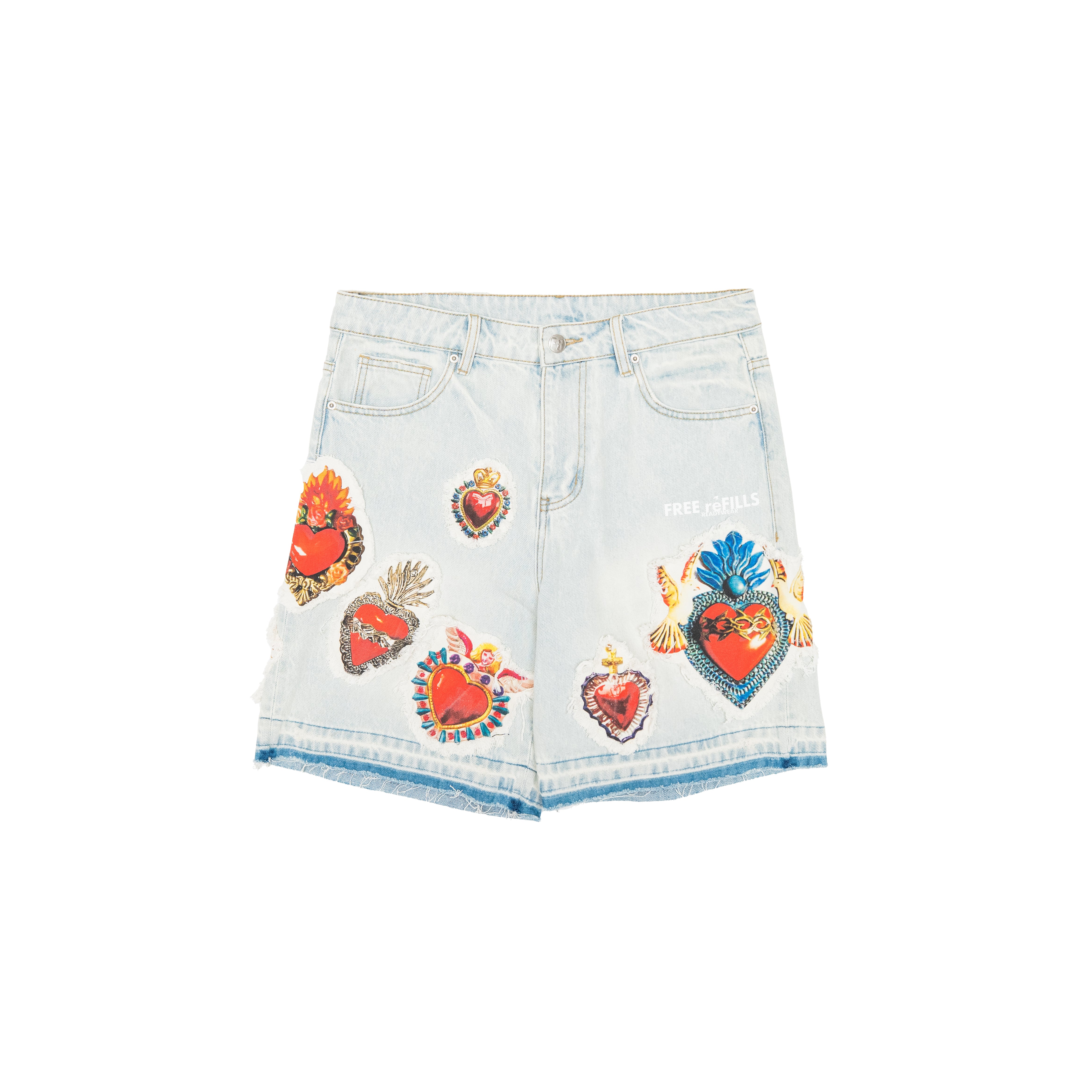 Light wash blue denim shorts featuring multiple colorful embroidered Sacred Heart patches on the front, with a small white embroidered text detail on the right hip.