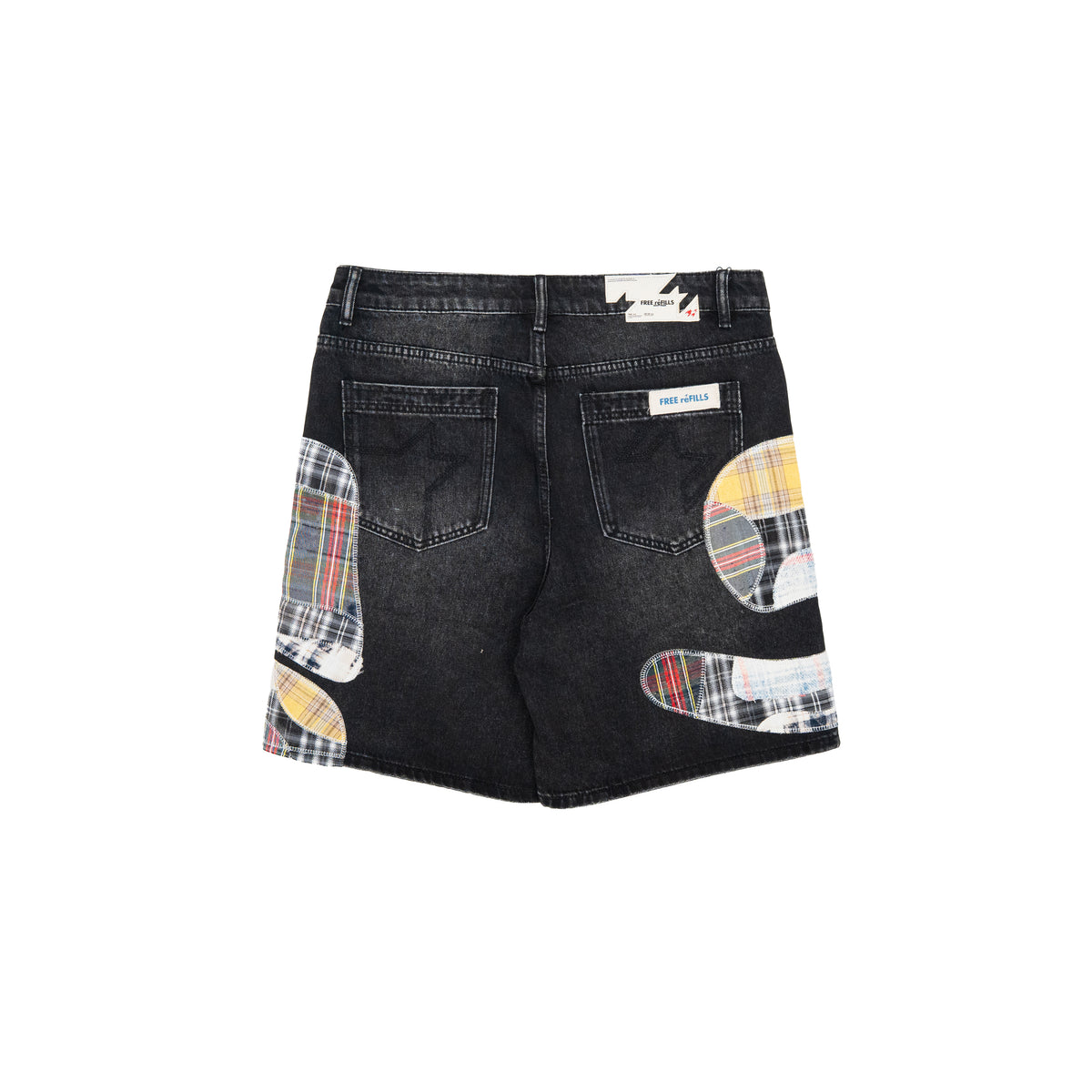 Black denim shorts with circular patchwork patches in plaid and solid colors on the back pockets, shown from the back against a white background.