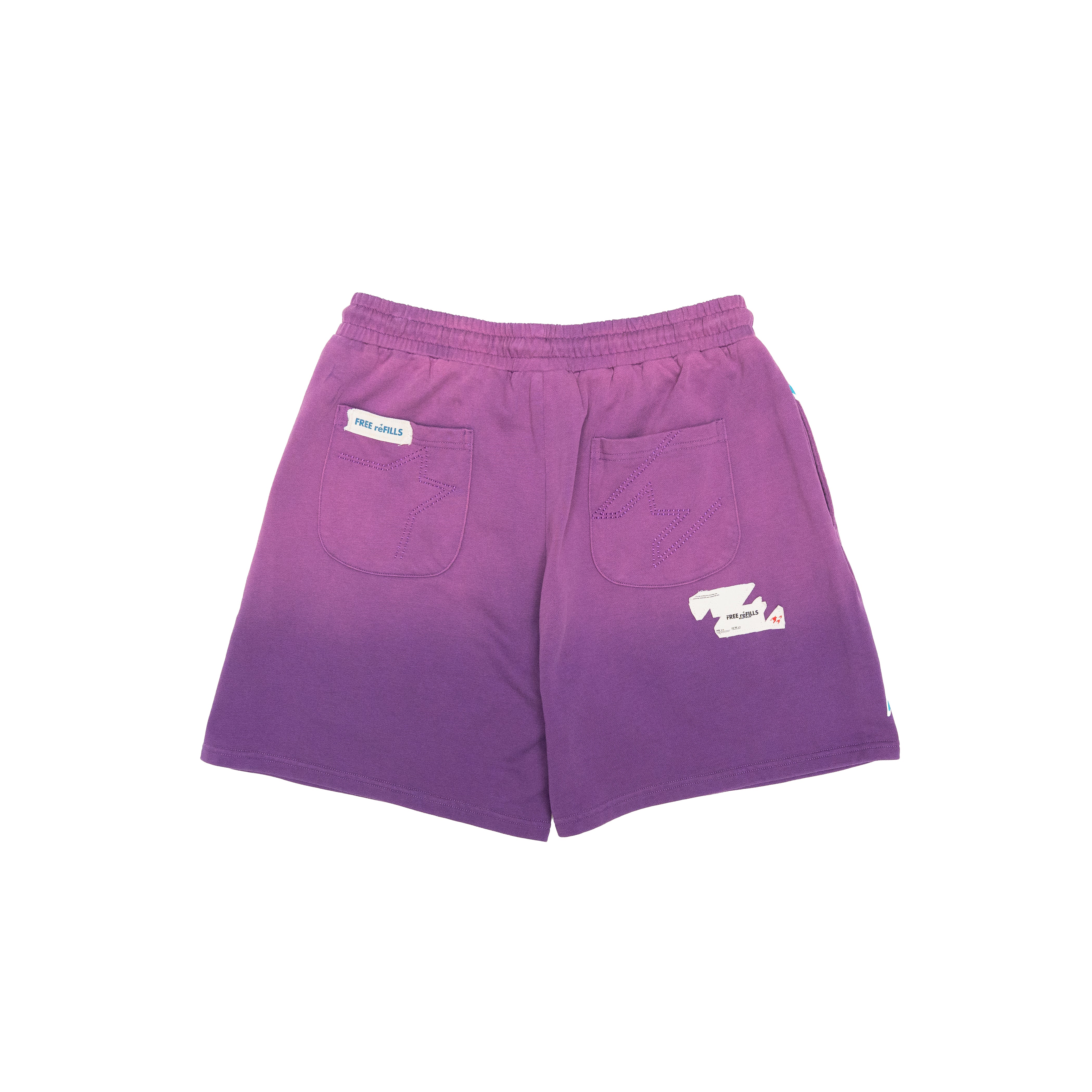 Purple gradient athletic shorts with an elastic waistband, two back patch pockets, and small white logo patches on the back, shown against a plain white background.