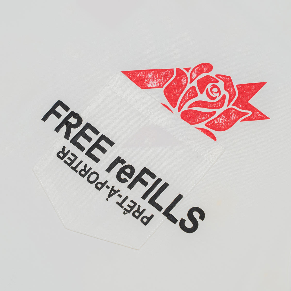 A white pouch with a red rose graphic and the text 'FREE reFILLS' and 'PRE-TA-PORTER' printed on it, shown on a light gray background.