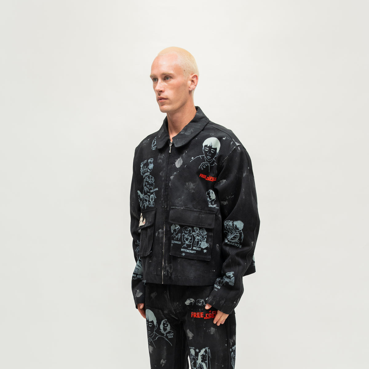 Miracle Jacket – Black – Three-quarter view on model showing the boxy fit and sleeve graphics.