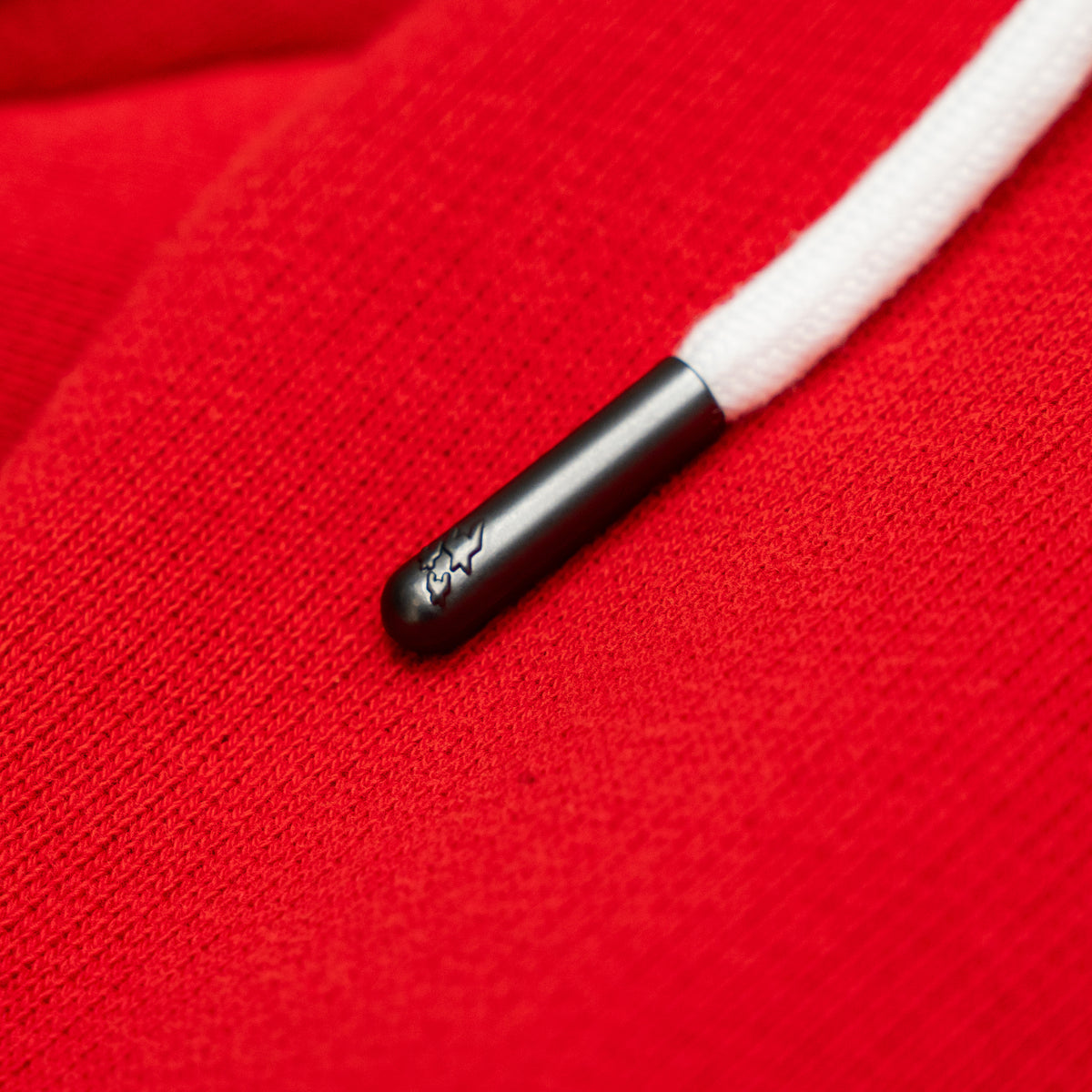 Sunday Service Flare Bottoms – Red – Close-up of white drawstring with black metal tip
