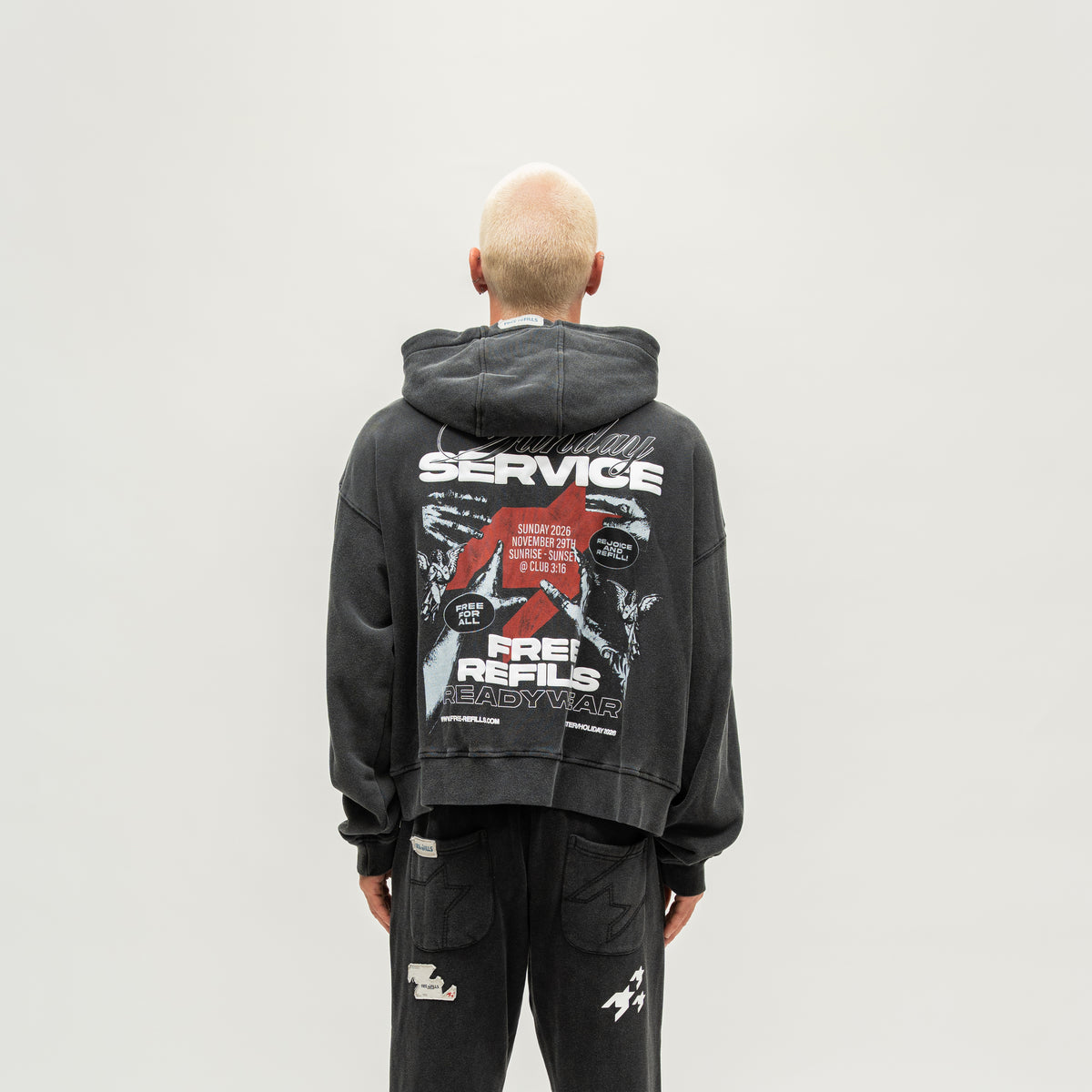 Sunday Service Hoodie – Black – Back view on model showing large Sunday Service graphic