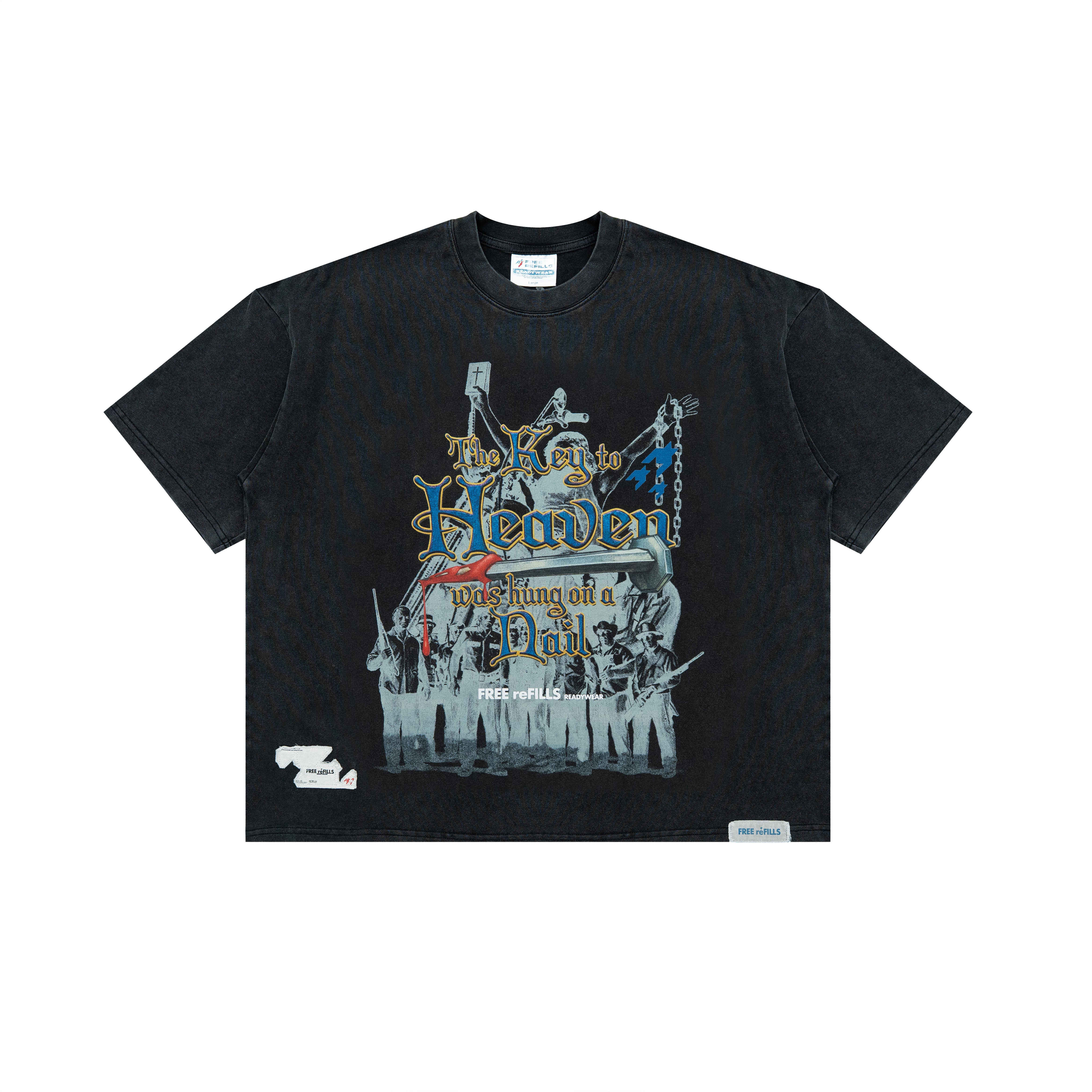 A black graphic t-shirt featuring a detailed illustration of a crucifix and a soldier with the text 'The Key to Heaven was hung on a Nail' in stylized blue and gold lettering.