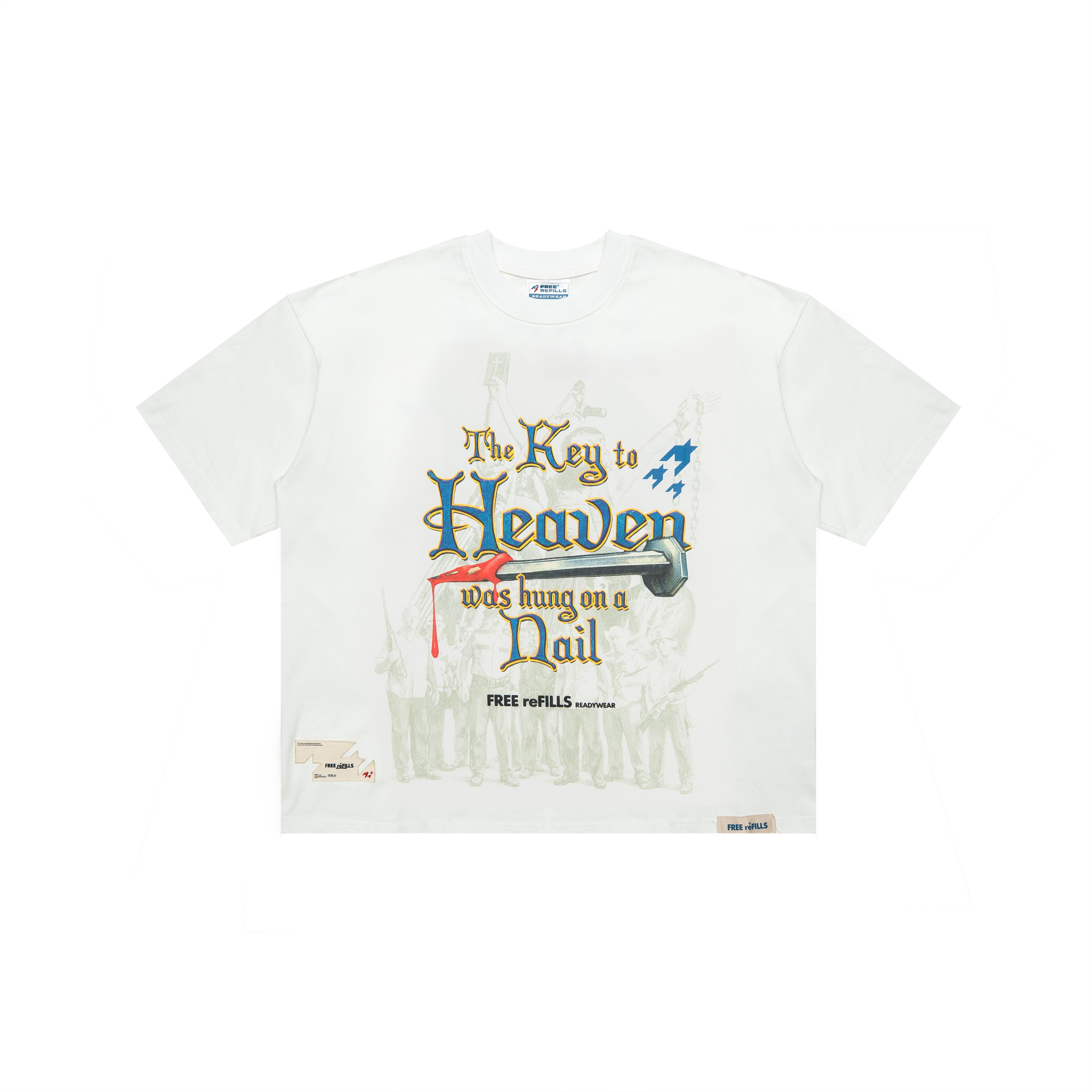 A white short-sleeve t-shirt featuring a graphic print on the front with the text 'The Key to Heaven was hung on a Nail' in blue, gold, and red lettering, accompanied by a large key illustration and a faint silhouette of a crowd. The brand 'FREE REFILLS' is printed below the graphic.