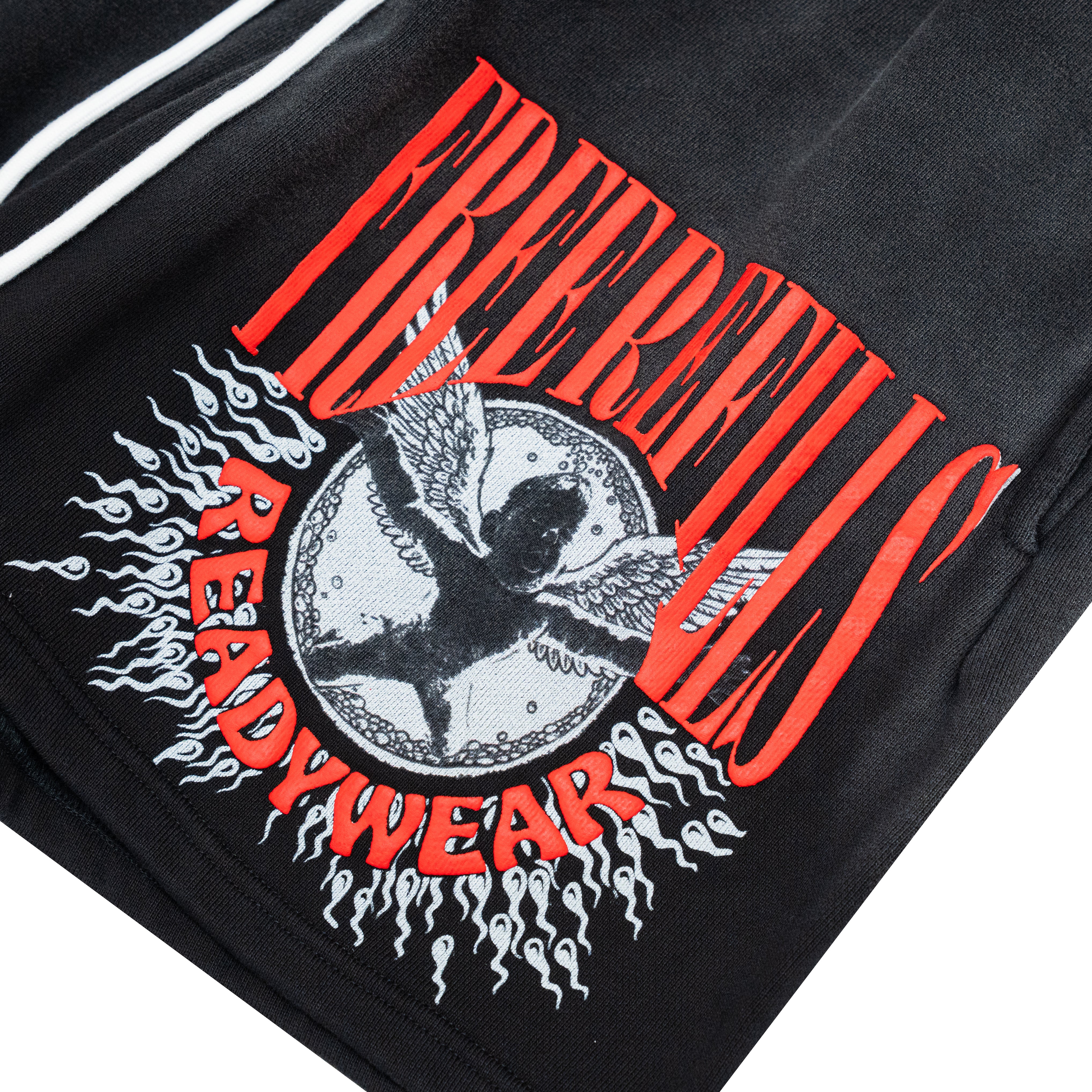 Close-up of a black sweatshirt featuring a large graphic print with the words 'FRE REFILLS READYWEAR' in red and white, surrounding a winged figure inside a circle.