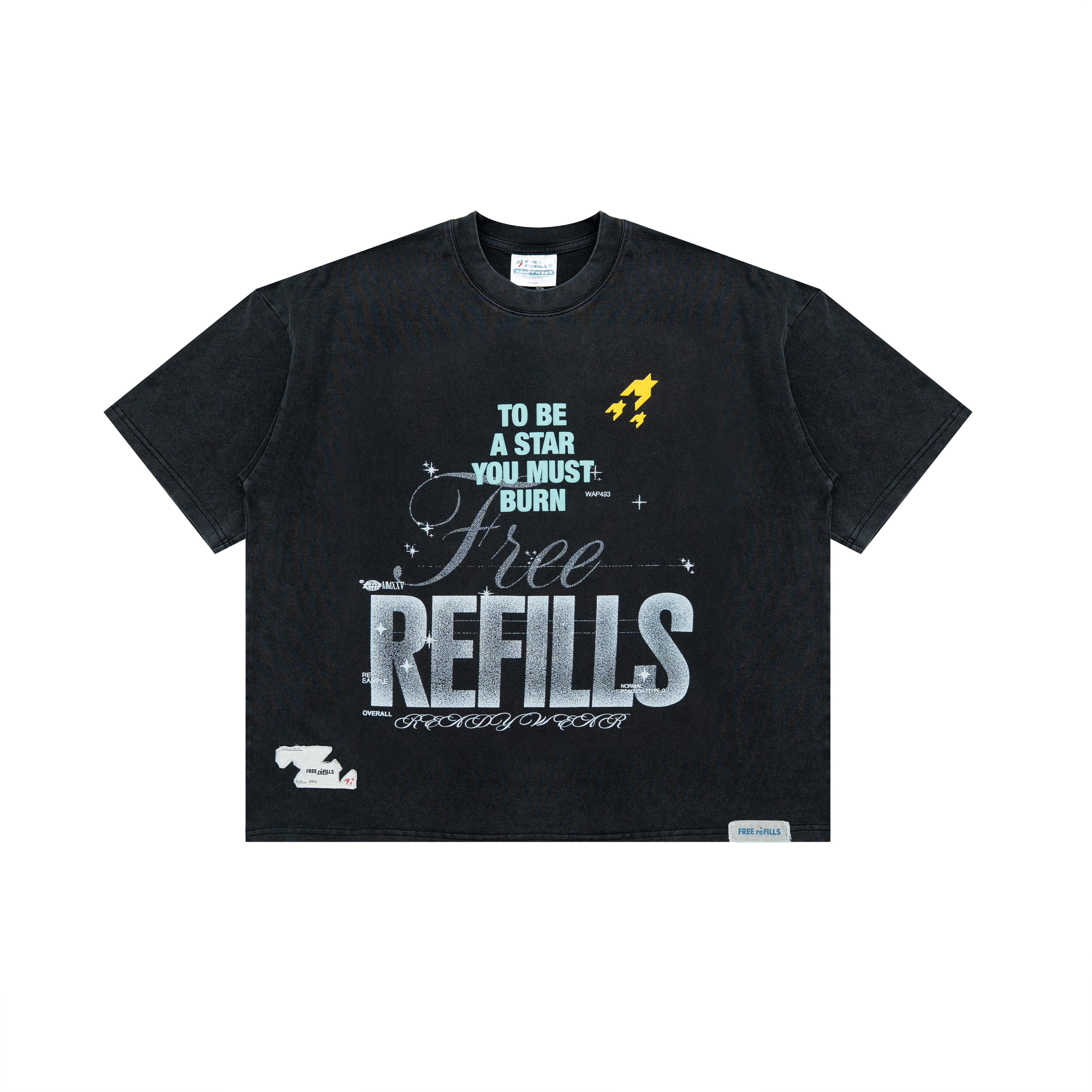 A black short-sleeve graphic t-shirt with a distressed design featuring the text 'TO BE A STAR YOU MUST BURN' in light blue and 'Free REFILLS' in large white letters, accompanied by a small yellow rocket graphic, shown flat on a white background.