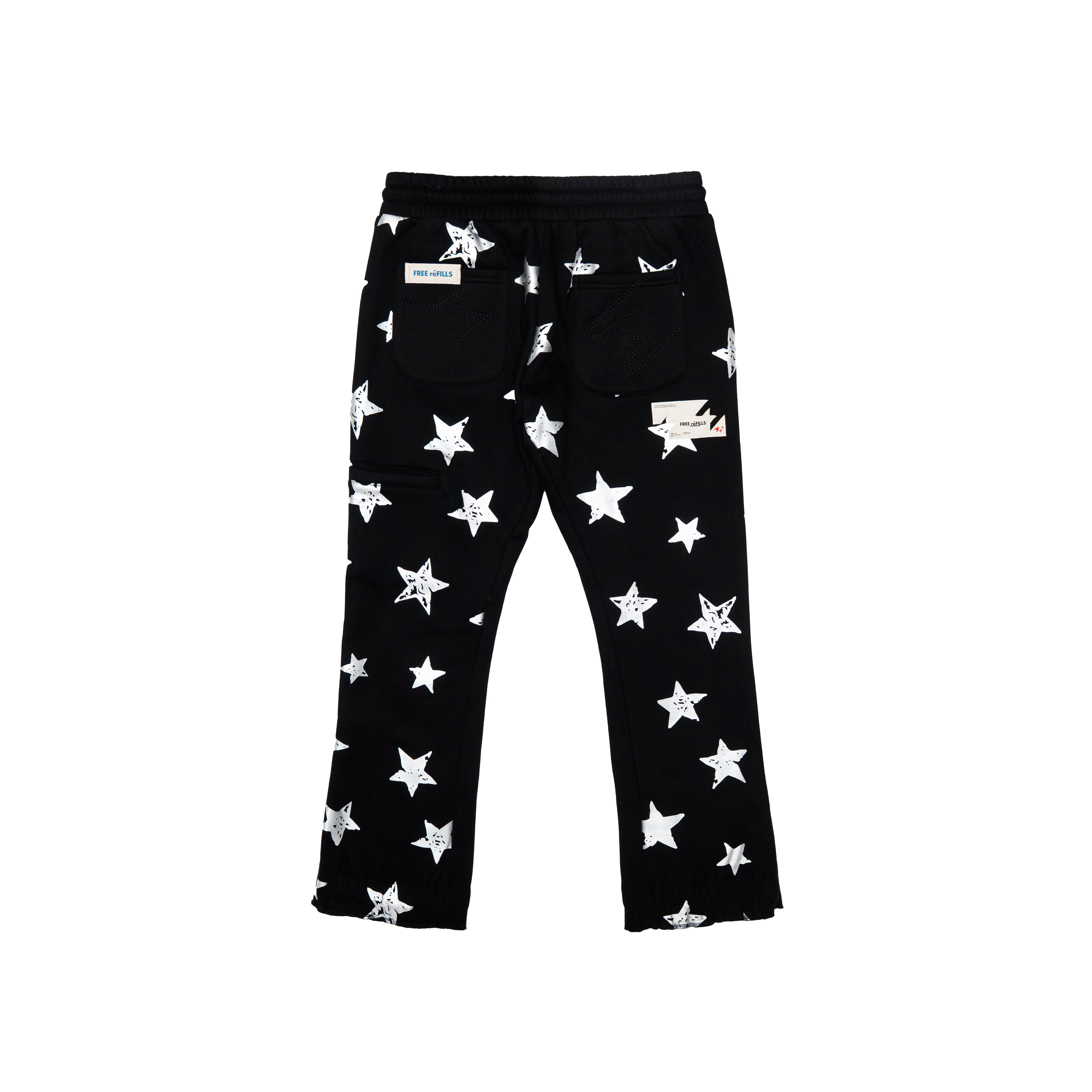 Black pants with a white star print pattern, featuring a drawstring waistband and a small brand patch on the left thigh.