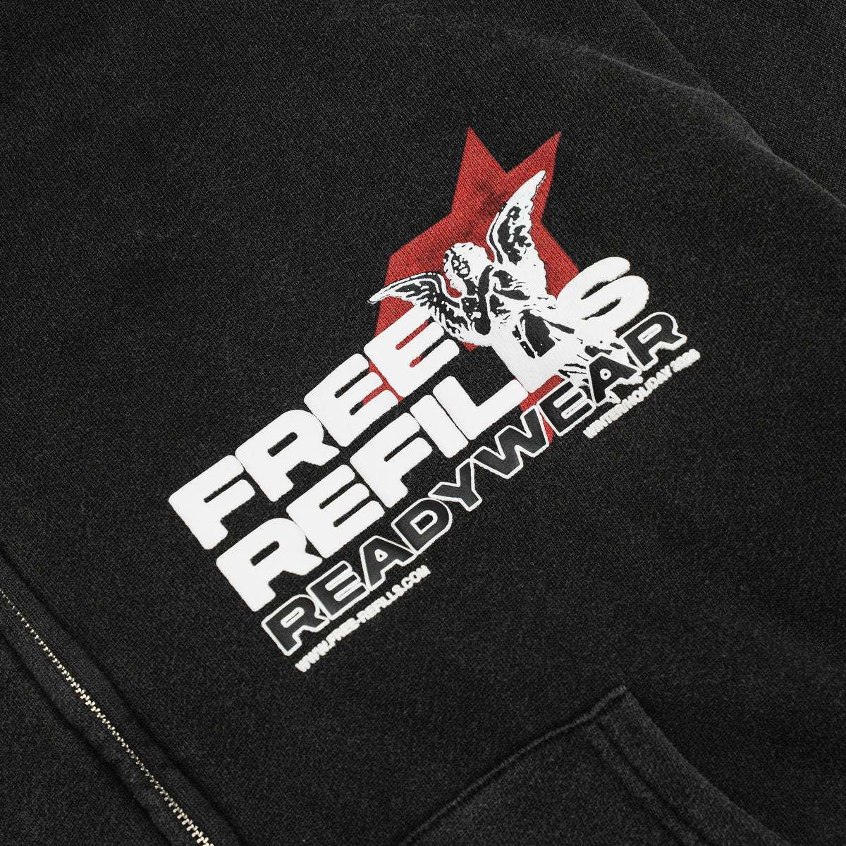 Sunday Service Hoodie – Black – Close-up of FREE ReFILLS chest lettering and cherub over red graphic