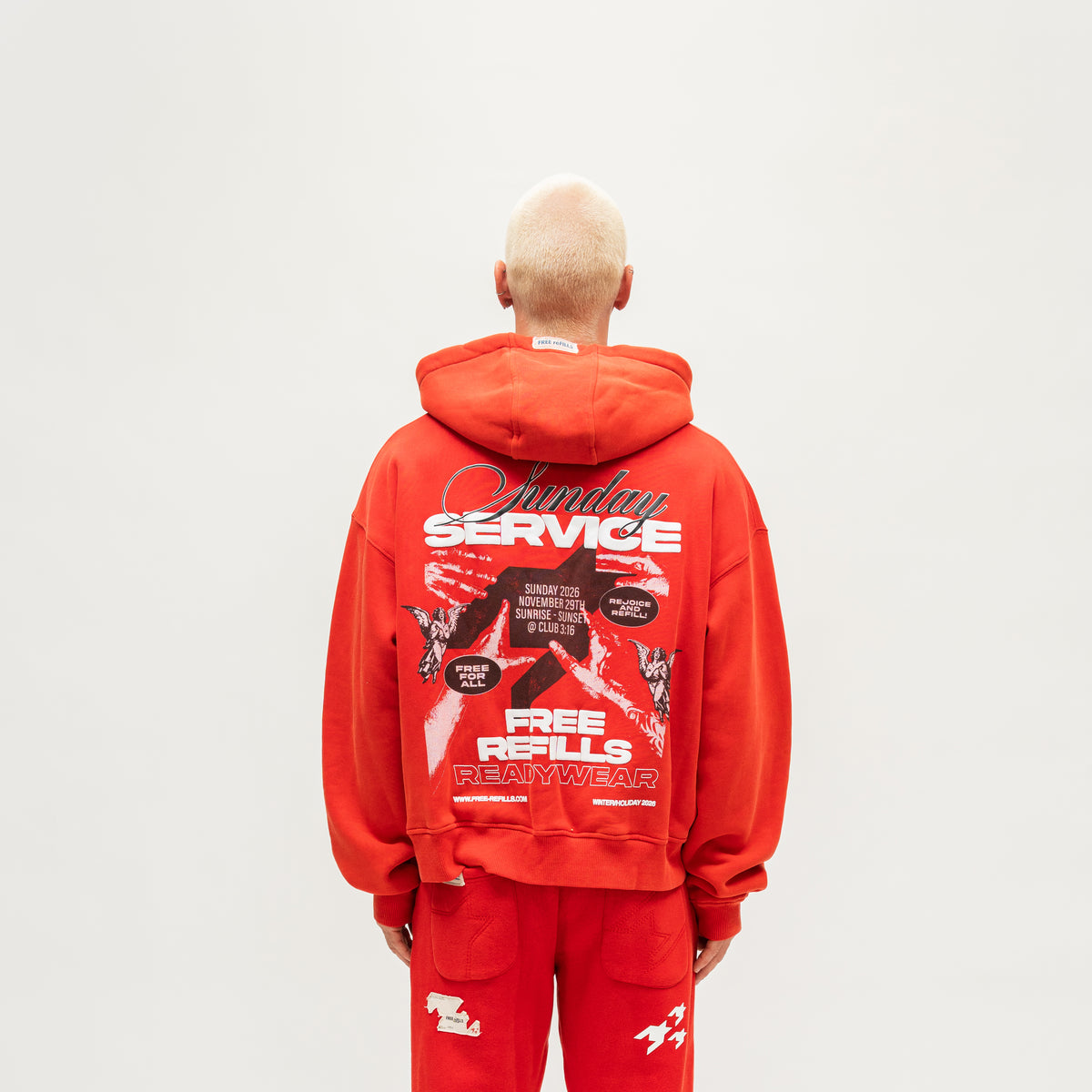 Sunday Service Hoodie – Red – Back view on model showing large Sunday Service graphic