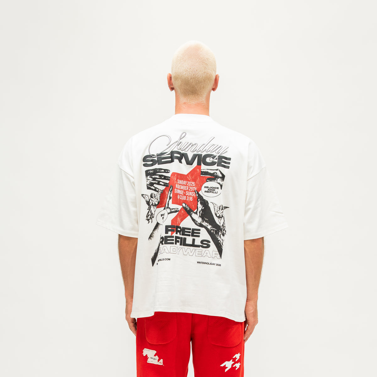 Sunday Service Tee – Cream – Back view on model showing large Sunday Service graphic