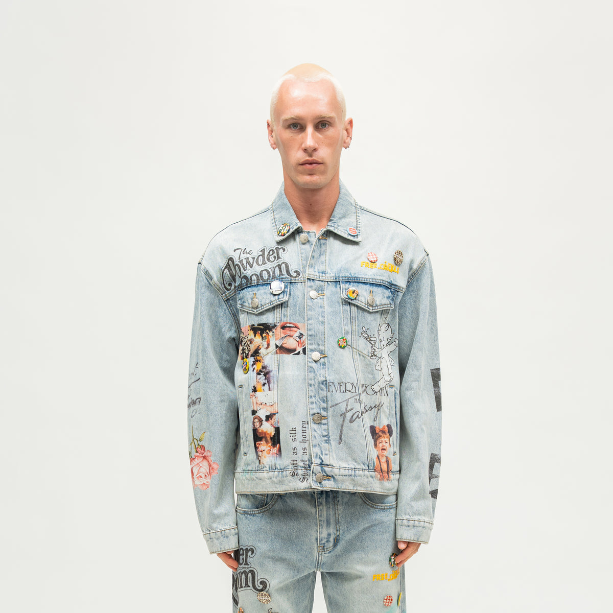 The Powder Room Jacket – Blue – Front view on model showing button closure, graphic prints and decorative pins