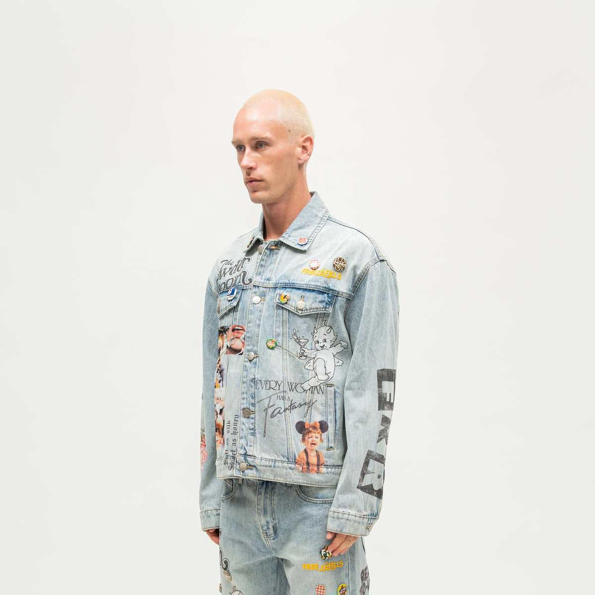 The Powder Room Jacket – Blue – Angled view on model showing chest pockets and sleeve graphics